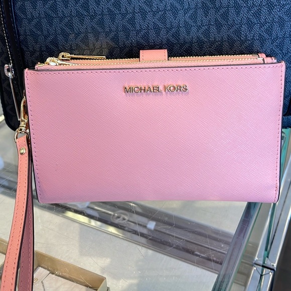 MICHAEL KORS
Jet Set Large Leather Smartphone Wristlet Wallet
Primrose 
NWT - Picture 1 of 16
